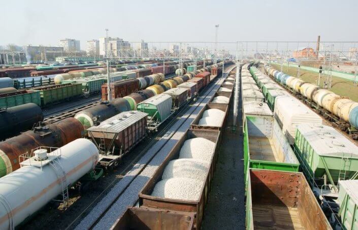 RESIDCO – Navigating Transportation Investment A busy rail yard with many railcars.